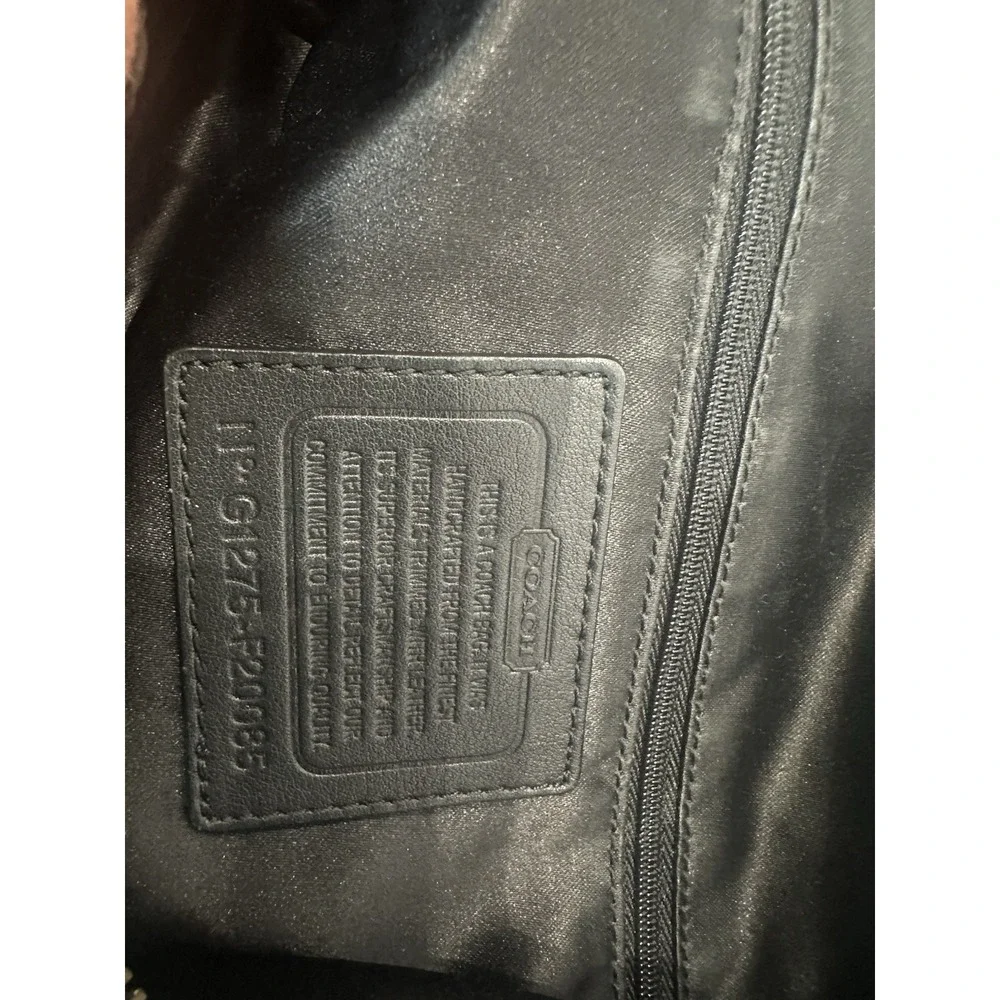 Coach black signature